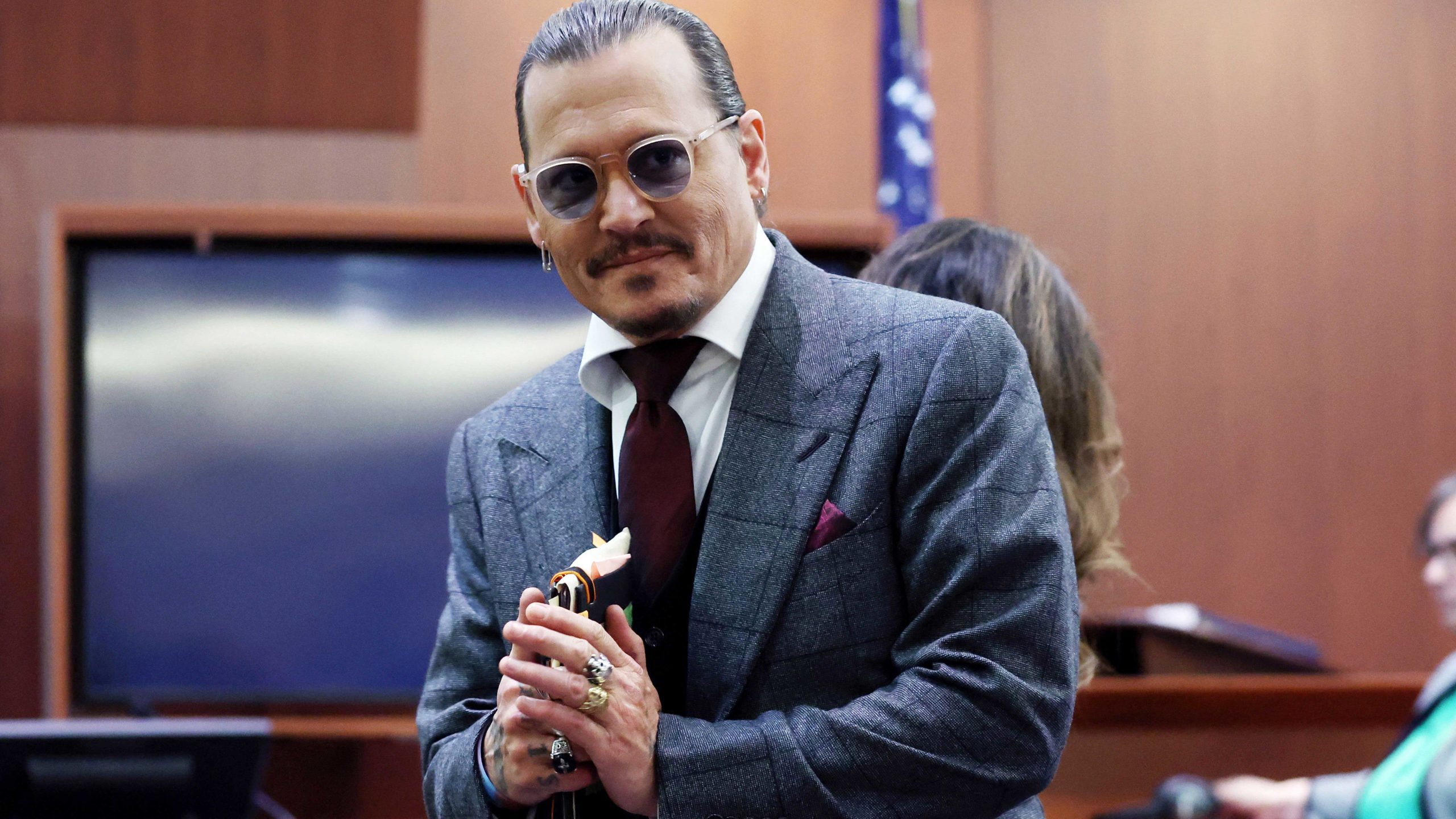 Johnny Depp Shows Off His Doodles to His Lawyer During Amber Heard